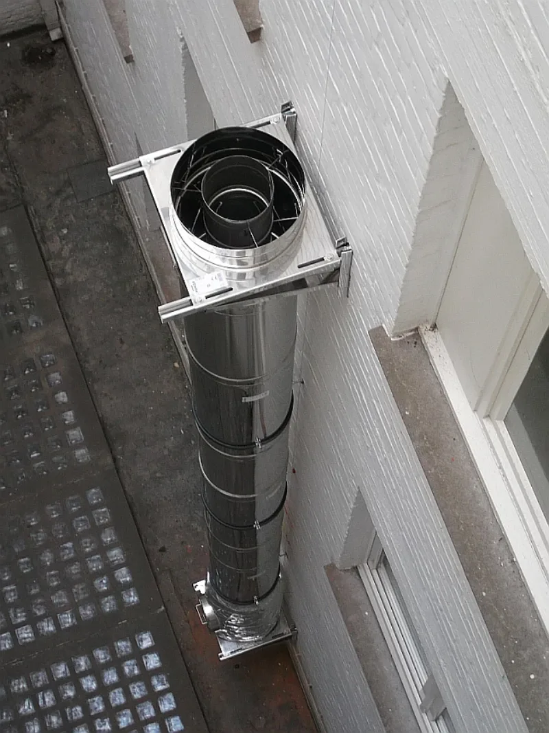 Rookgasafvoer van nieuwe condenserende CV-ketels in een bestaand appartementsgebouw